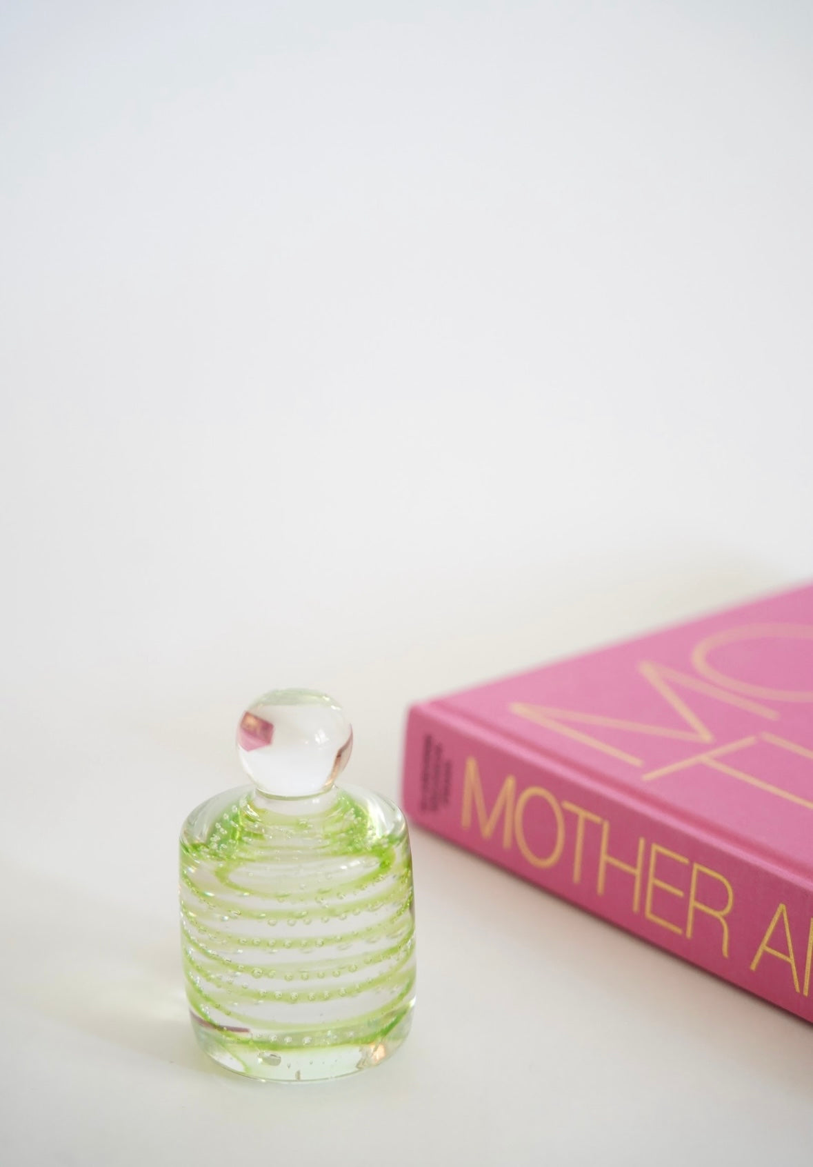 MID CENTURY GREEN GLASS PAPERWEIGHT