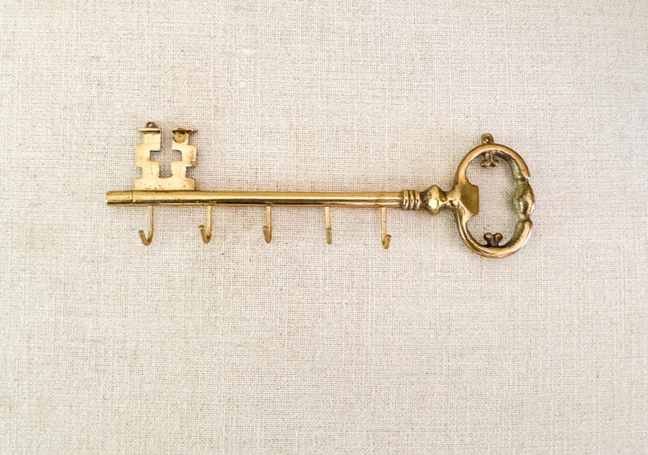 Brass skeleton wall hook