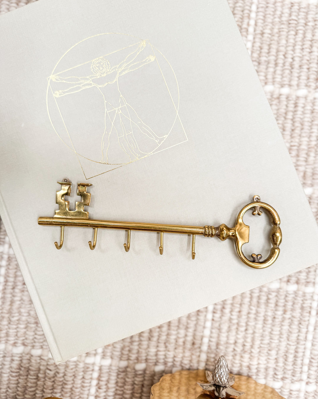 Brass skeleton wall hook