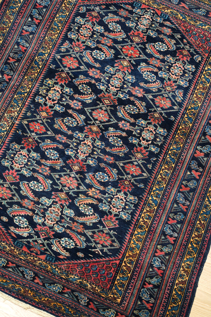 ANTIQUE PERSIAN RUG