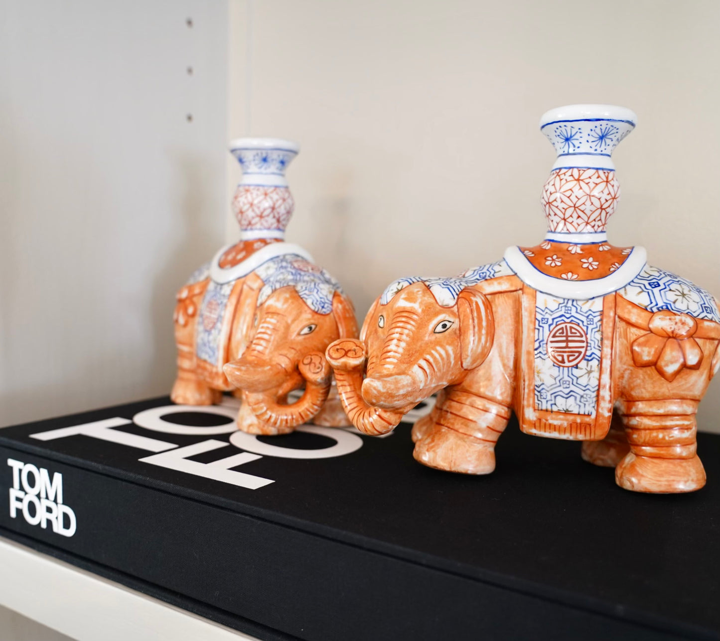 PAIR OF CHINOISERIE ELEPHANT CANDLESTICKS