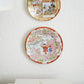 PAIR OF DECORATIVE GEISHA PLATES